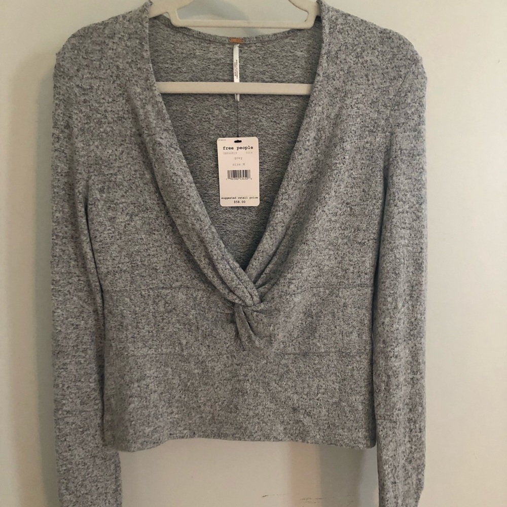 NEVER WORN free people deep v top! Tag still on